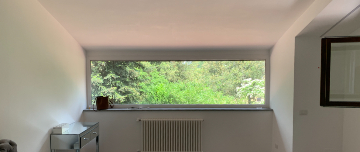 Vetrata lunga camera da letto infisso in pvc roma